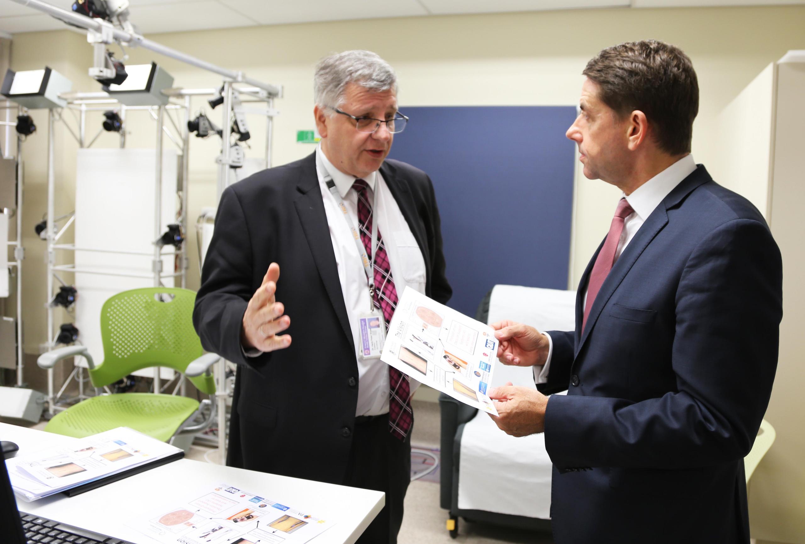 Professor H. Peter Soyer and Health Minister Cameron Dick